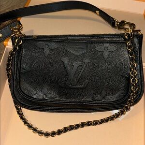 Louis Vuitton Black Mini Bag with Gold Accents
